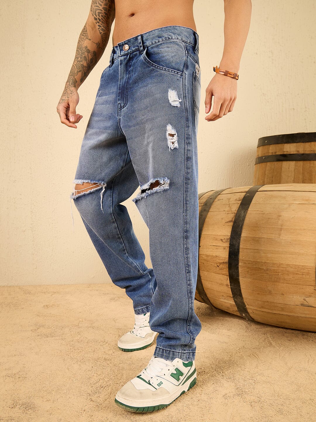 Mens distressed tapered jeans hotsell